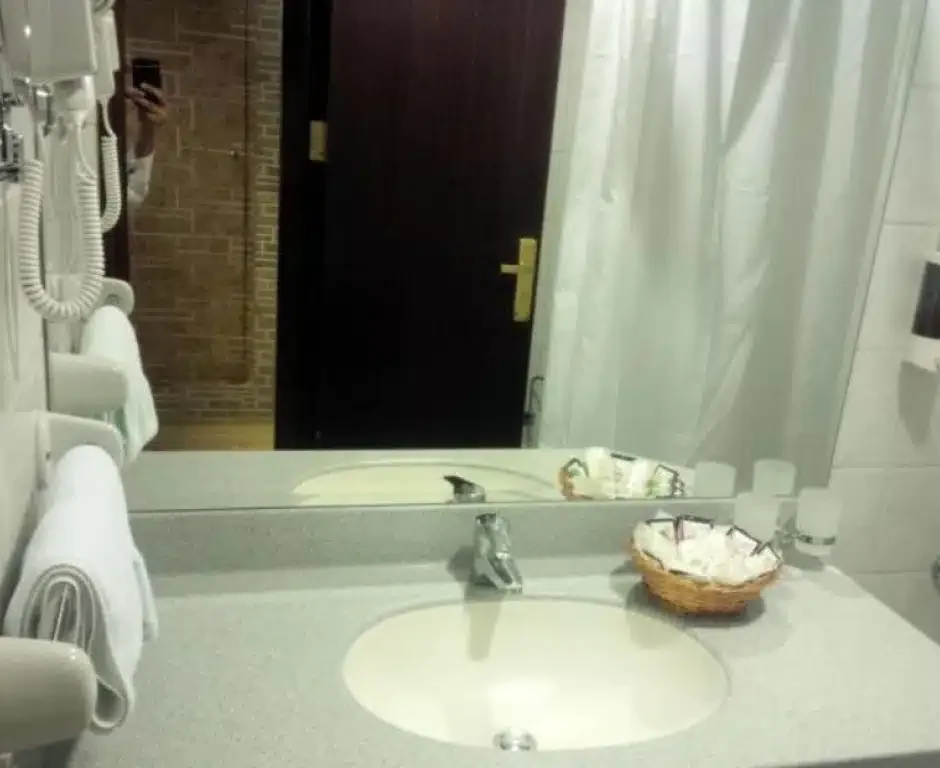 Jawharat Al Rasheed Hotel — bathroom vanity