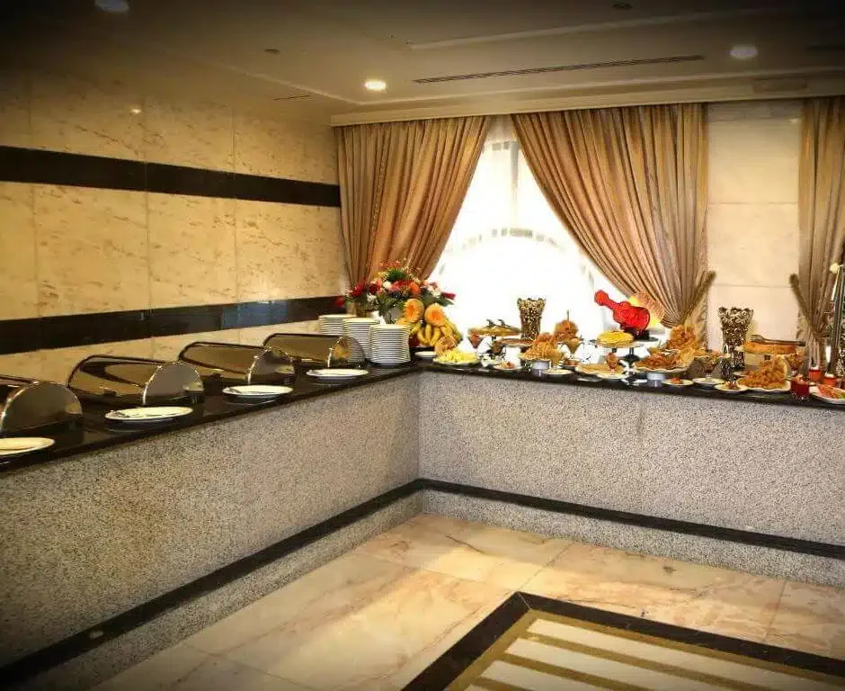 Nozul Al Rawda Hotel — buffet area