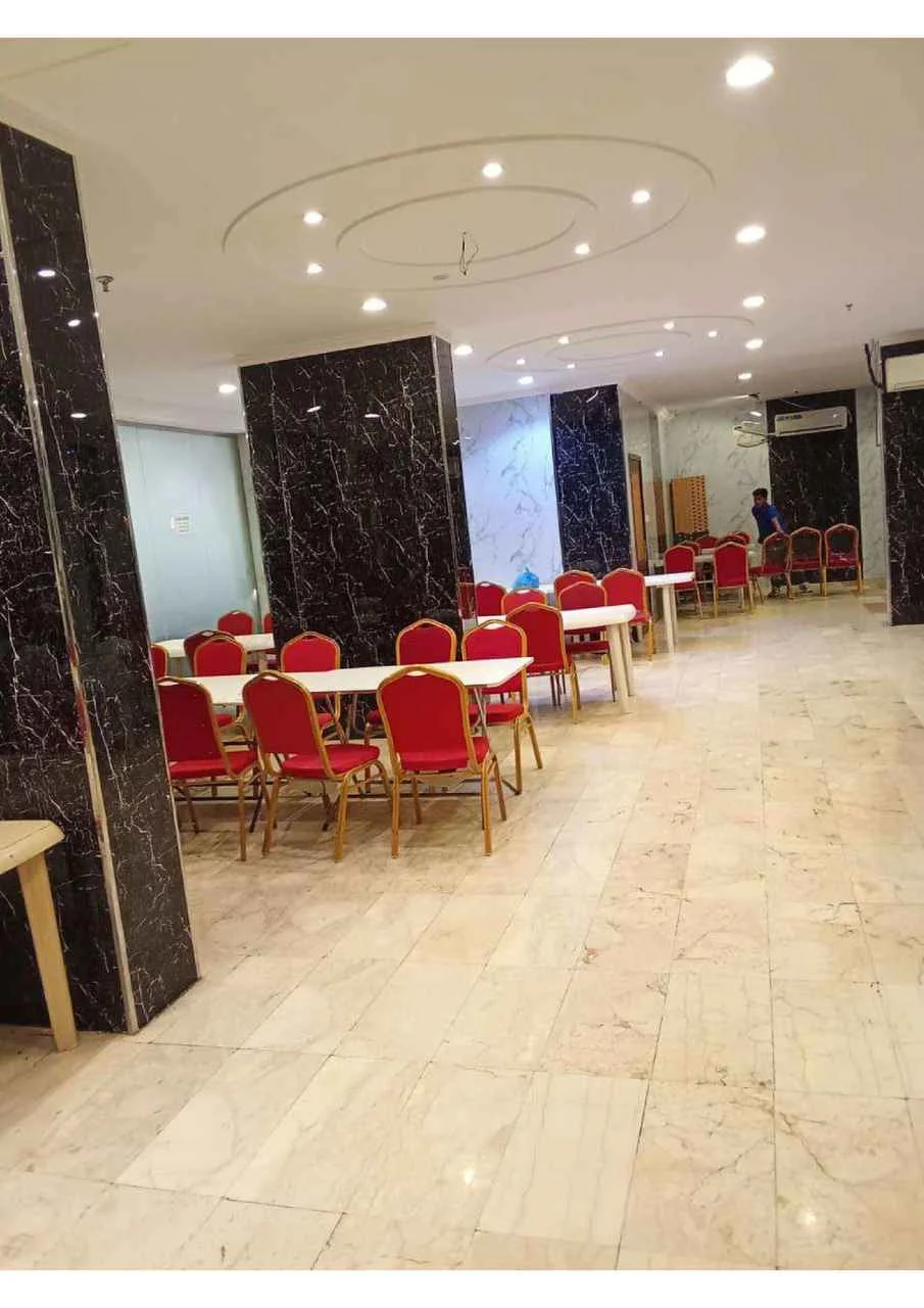 OYO 475 Al Rafidien Almasi Hotel — dining hall